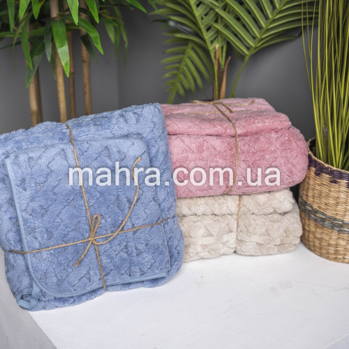 Фото  товара набір рушників в мішечку