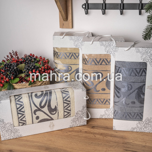 Фото  товара Набір банних рушників з візерунком